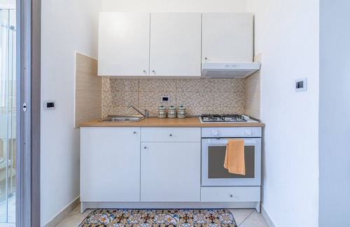 Granelli Apartamento | Apartamento vacacional "Il Pescatore" con vistas al mar, terraza compartida y aire acondicionado