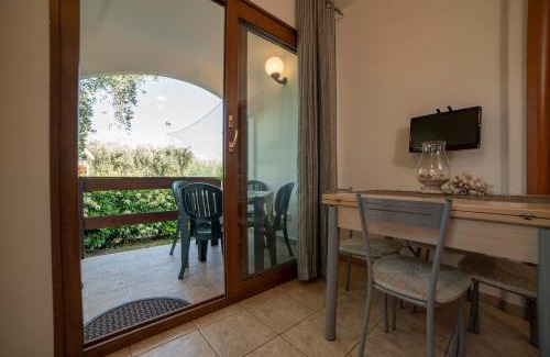 Mattinata Casa | Holiday Apartment orchidea with swimming pool and private beach