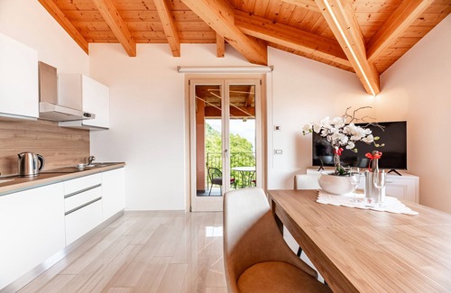 Musso Apartamento | Apartamento vacacional "Picolla Orchidea Finestra Sul Lago" con terraza privada