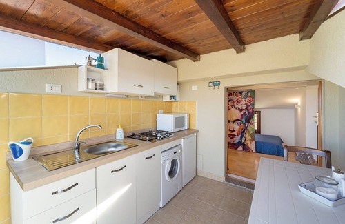 Su Forti Casa | Casa de vacaciones "Bilocale Panoramico" con vistas al mar, jardín y aire acondicionado