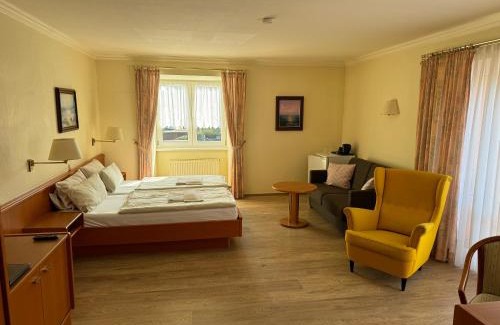 Koelpinsee Hotel | Hotel garni SEESCHLÖSSCHEN