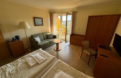 Koelpinsee Hotel | Hotel garni SEESCHLÖSSCHEN