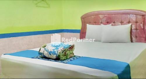 Tanahgrogot Hotel | Hotel Indah Grogot Syariah Mitra RedDoorz