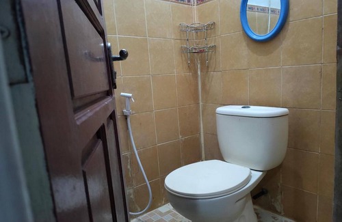 Palopo Hotel | Hotel O Qq Kost Near Pantai Kebesaran Beach