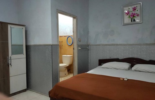 Palopo Hotel | Hotel O Qq Kost Near Pantai Kebesaran Beach