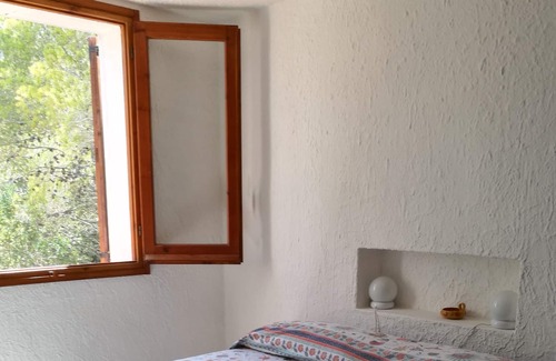 Carloforte Casa | Casa inmersa en el bosque de pinos