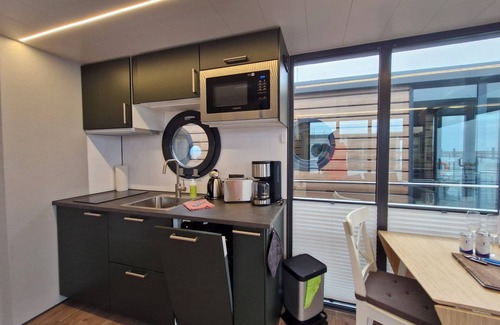 Wendtorf Alquiler De Eote | Houseboat Fjord del Sol with bio sauna and roof terrace in Wendtorf / Kiel Fjord