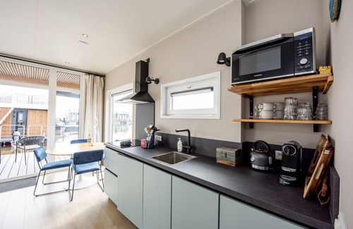 Offingawier Alquiler De Eote | Casa flotante Sneekermeer deportes acuáticos