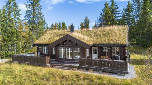 Nord-Aurdal Casa | HYTTEEVENTYR I VALDRES MED JACUZZI, 5 soverom, alpinbakke og skiløyper like ved!
