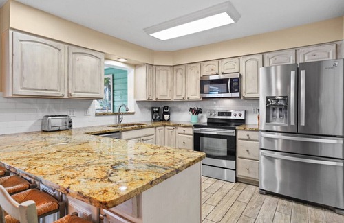 Fort Myers Apartamento | Zero Edge Pool * Spa * Bicicletas * Kayaks * Playa y equipo de pesca * Wifi gratis * Balcón *