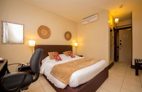 Nairobi Hotel | Inviting Room with Full Access to Spa & Wellness Center for Ultimate Relaxation