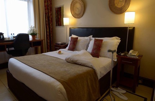 Nairobi Hotel | Inviting Room with Full Access to Spa & Wellness Center for Ultimate Relaxation