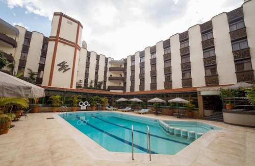 Nairobi Hotel | Inviting Room with Full Access to Spa & Wellness Center for Ultimate Relaxation