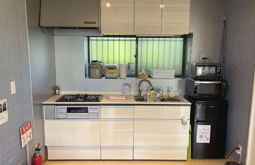 Futo Villa | Izu Kogen Ito · Glamping en Izu Kogen!Barbacoa con mascotas en la terraza de madera.Cabaña familiar con tobogán hamaca