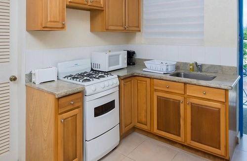 St. Lawrence Gap Hotel | Just What You Were Looking For! Kitchen, Oceanfront, Free Parking, Onsite Pool