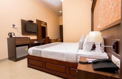 Irinjalakuda Hotel | Kallada Golden Hotel