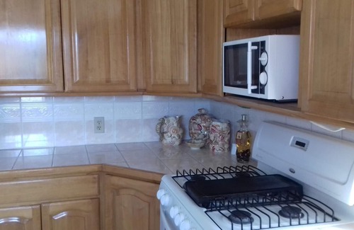 Jonesville Villa | Kayak, Snorkel, Dive Waterfront 2BR 2BA A/C Beautiful Quiet Caribe bight w/pool