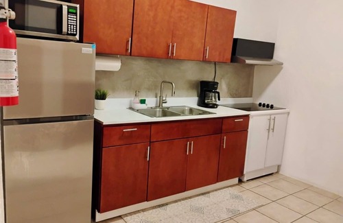 Eleanor Roosevelt Casa | La Casa de Ada Near Airport & Beaches Charming 3-bedroom house with AC andWiFi