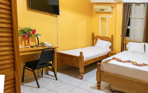 Roseau Casa | La Flamboyant Hotel
