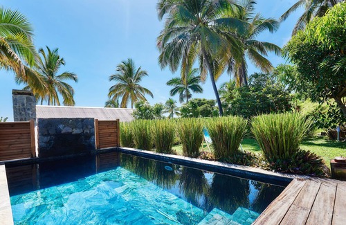 Cap Champagne Villa | La villa Paille en Queue 4 *: Villa de lujo con vistas al mar piscina en Saint-Gilles