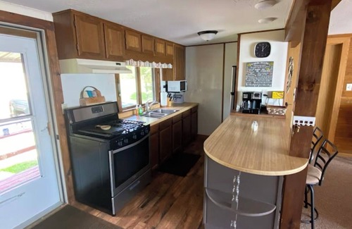 Manistique Cabaña | Lakefront getaway on Indian Lake with private dock