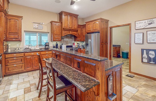 Rambo Riviera Casa | Lakefront home with hot tub, firepit, washer/dryer, kayaks, & hammocks