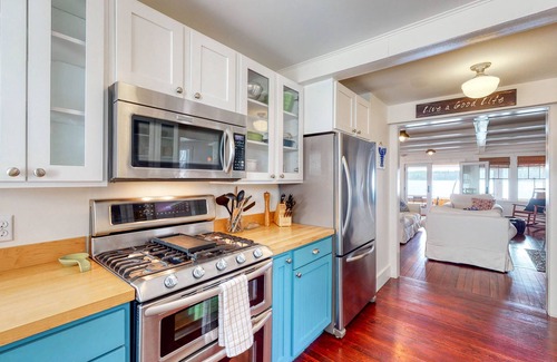 Monmouth Casa | Lakefront home with private dock, kayaks, firepit, grill, & sunroom