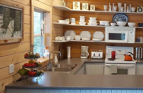 Lower Ohio Cabaña | Lakefront Living in a Sunset Cove with kayaks