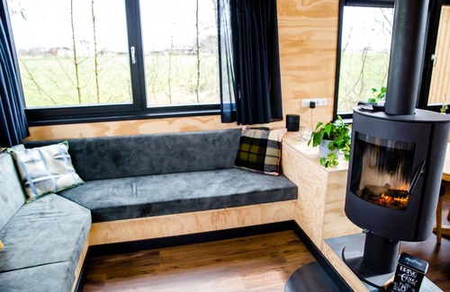 Grou Cabina | Lakefront Nature House with own shared dock in Friesland: Ljurk