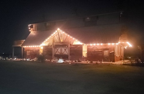 Cleburne Casa | Large barn on an acreage with water views, covered patios, fireplace, and AC