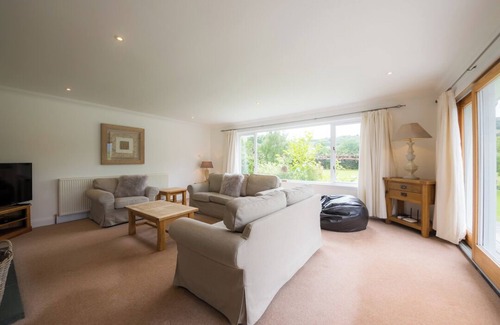 Ardeonaig Cabina | Loch casa rural con fachada en las Tierras Altas de Escocia con bañera de hidromasaje