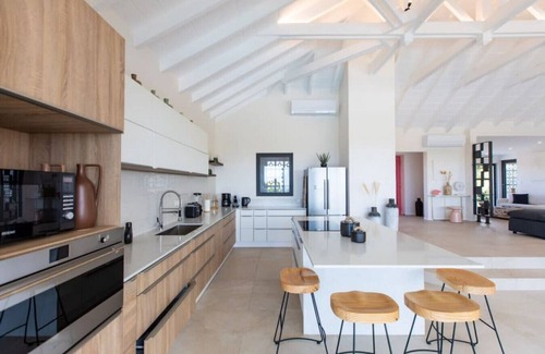 Les Terres Basses Villa | Luxurious Solis Villa: Breathtaking 7-BR Oceanview Retreat in Prestigious Gated Community