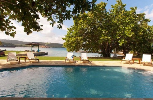 Discovery Bay Villa | Lujosa villa privada de 7 dormitorios frente a la playa en Discovery Bay - Comuníquese con Exceptional Villas