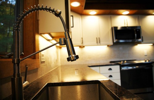 Wallenpaupauk Lake Estates Casa | Luxury Lakefront: Hot Tub, Fireplace, Pet Friendly, Arcade, Watercraft, + more!