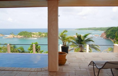 Calibishie Villa | Lujosa villa privada frente al mar con vistas espectaculares.