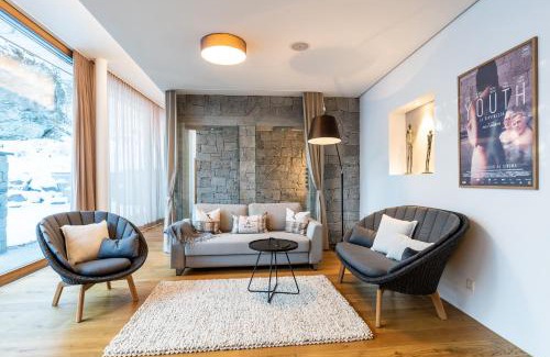 Flims Apartamento | Luxus-Mountain-Suite Rocca Bella mit Dampfbad & saisonalem Aussen-Pool