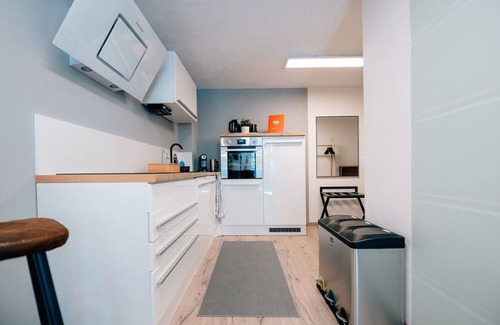 Weigenheim Apartamento | Modern apartment (40 sqm) with private terrace in the Mediterranean garden