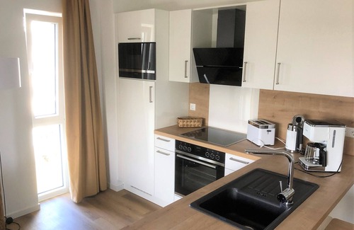 Schillig Apartamento | Modern, high-quality vacation apartment, sauna, large balcony, close to the beach