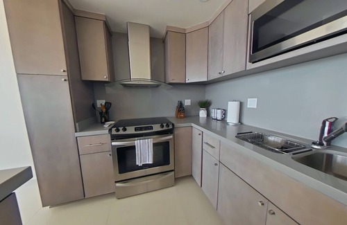 Centro Playas Condominio | Modern Ocean View Condo with Private Beach