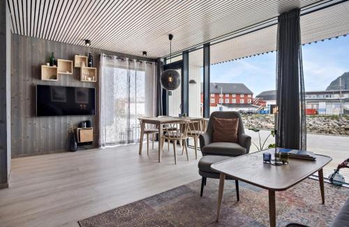 Henningsvaer Apartamento | Moderne leilighet ved sjøen med opptil åtte sengeplasser