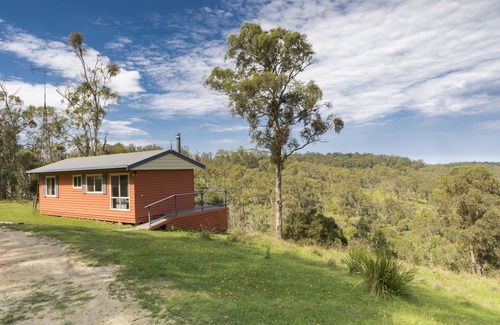 Ebor Cabaña | Moffat Falls Cottage overlooks stunning waterfalls and mountain views