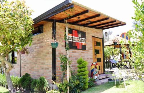 Santa Rosa de Cusubamba Hotel | Molino de Café Cabañas Lodge