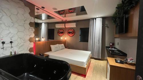 Zona Leste Hotel | Motel Jardim Secreto