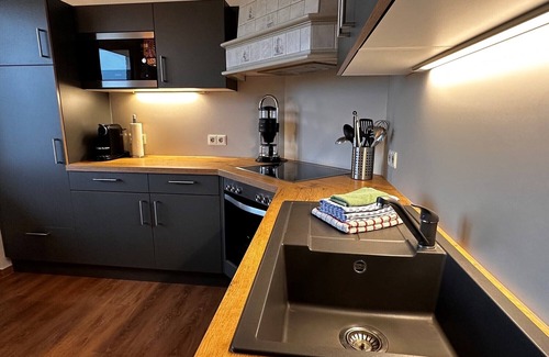 Steenodde Casa | Multi-generation house right on the water with terrace and garden