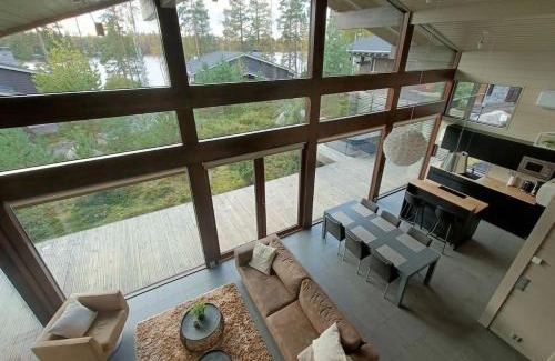 Ahtari Villa | Naava Resort Luppo - Upea huvila ulkoporealtaalla sekä järvinäkymällä