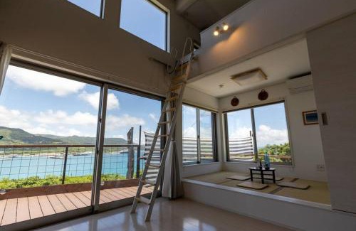 Motobu Villa | NEW!パノラマオーシャンビューのテラスジャグジーは圧巻。新築2階建て吹抜け天井リビングは開放感抜群