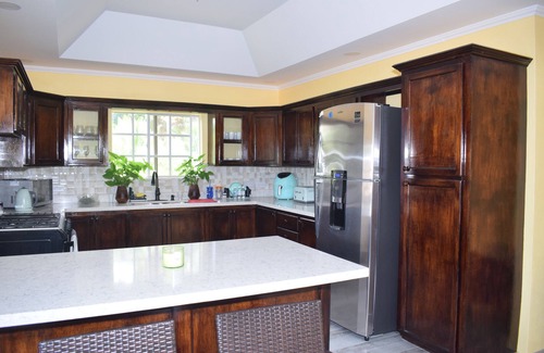 Moonhole Villa | New construction spacious villa with beautiful sunset view quick ride to beach!