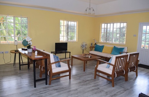 Moonhole Villa | New construction spacious villa with beautiful sunset view quick ride to beach!