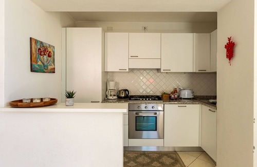 San Carlo Apartamento | Hermoso apartamento para 6 personas con TV, terraza y mascotas permitida