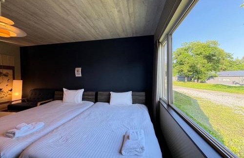 Niseko Apartamento | NISEKO VILLA kiraku HOU 車利用にオススメ ニセコ駅 各スキー場迄車で約15分